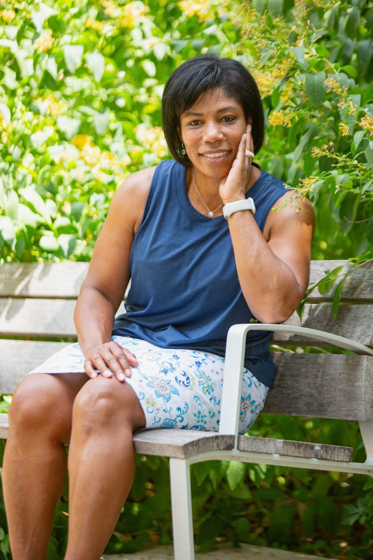 Founder of Essential Metabolic Health seated outdoors